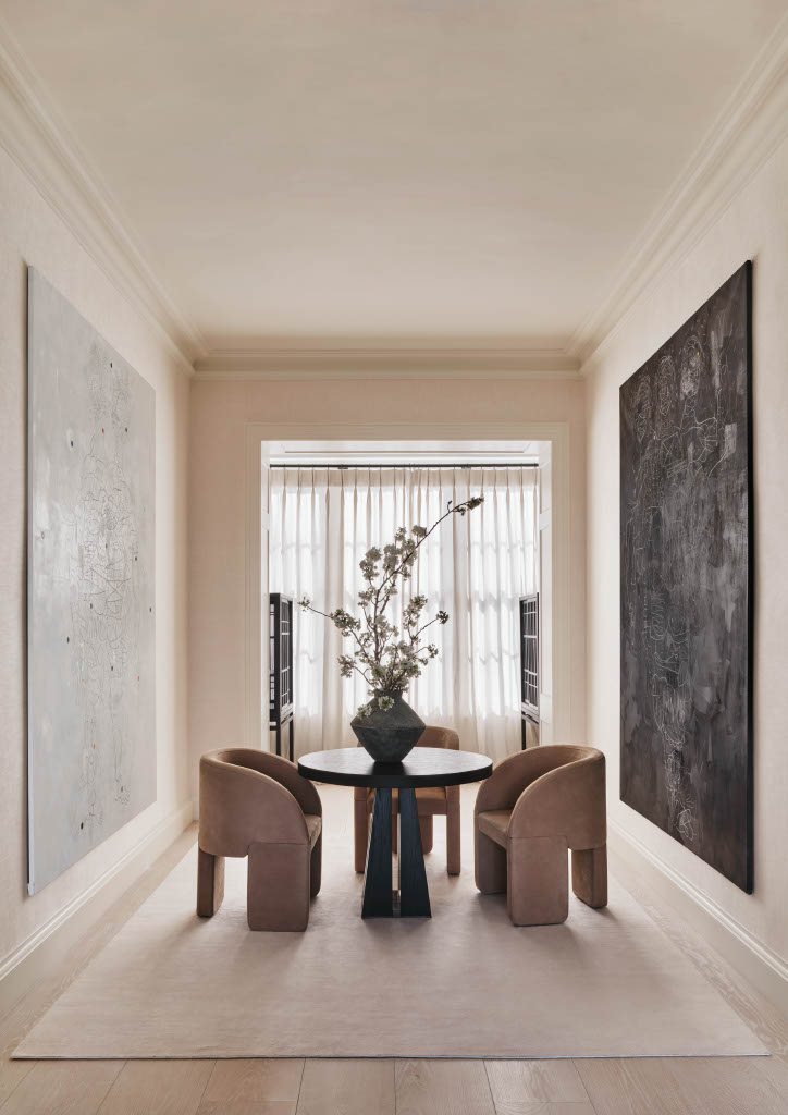 Belgravia townhouse hallway with paired artworks