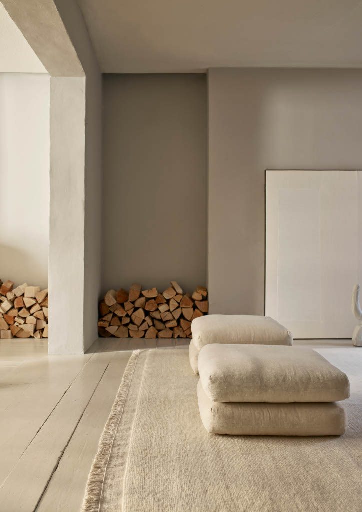 House of Grey lounge with natural tones and object placement