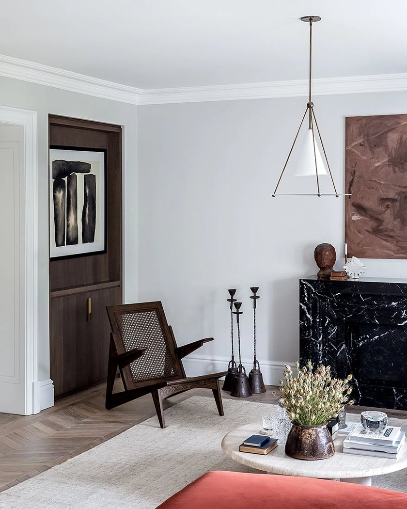 Apartment living room with artwork and soft neutral interiors
