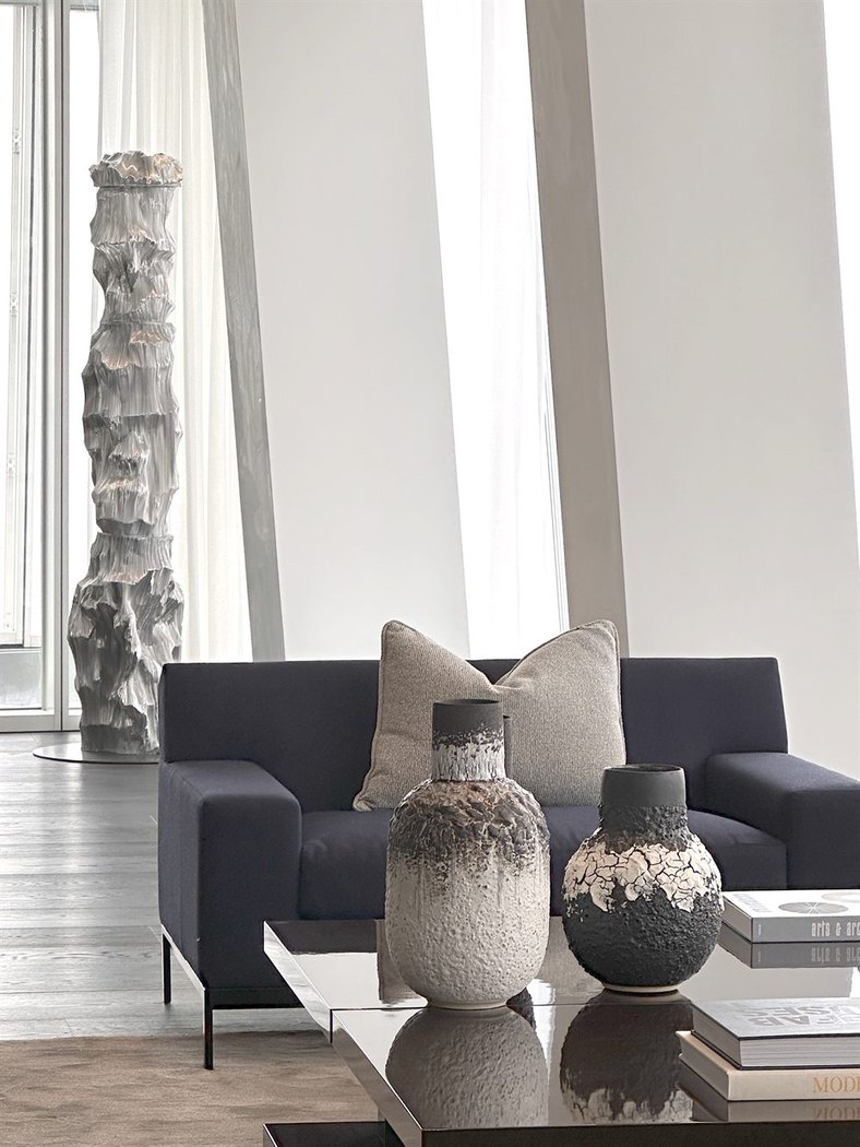 Private residence detail with ceramic vessels in natural light